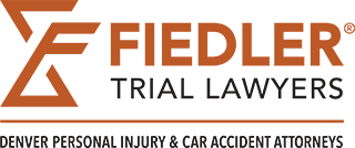 Logo for Fiedler Trial Lawyers with stylized initials "F" and "L." Text below reads "Denver Personal Injury & Car Accident Attorneys.